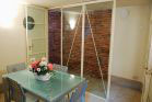 kitchen, glass wall and medieval style brick wall