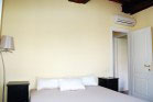 bedroom with air conditioning system