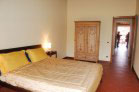 bedroom on the main level with a queen bed