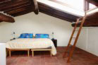 loft room with two singles that may be easily moved together
