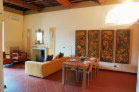 large living and dining area with covered terrace